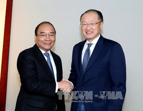Thủ tướng Nguyễn Xuân Phúc tiếp lãnh đạo các tổ chức tài chính và doanh nghiệp quốc tế  - ảnh 1